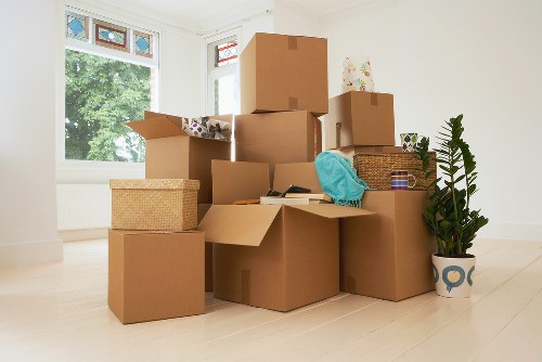 Professional movers loading furniture during a Hanwell removal